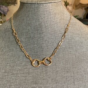 Elegant Gold Chain Necklace featuring a Snaffle bit focal point
